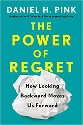 Pink - The Power of Regret, how looking backward moves us forward - title in yellow on a teal background with an image of a crumpled up piece of paper